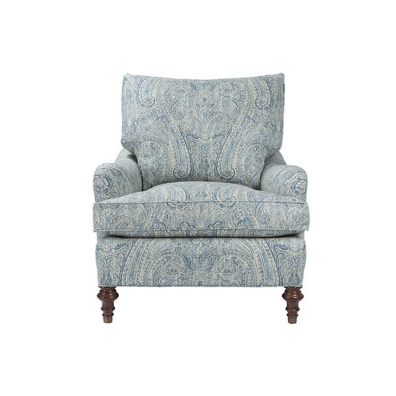 Blue paisley upholstered armchair, front view.