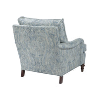 Blue paisley upholstered armchair, back angled view.