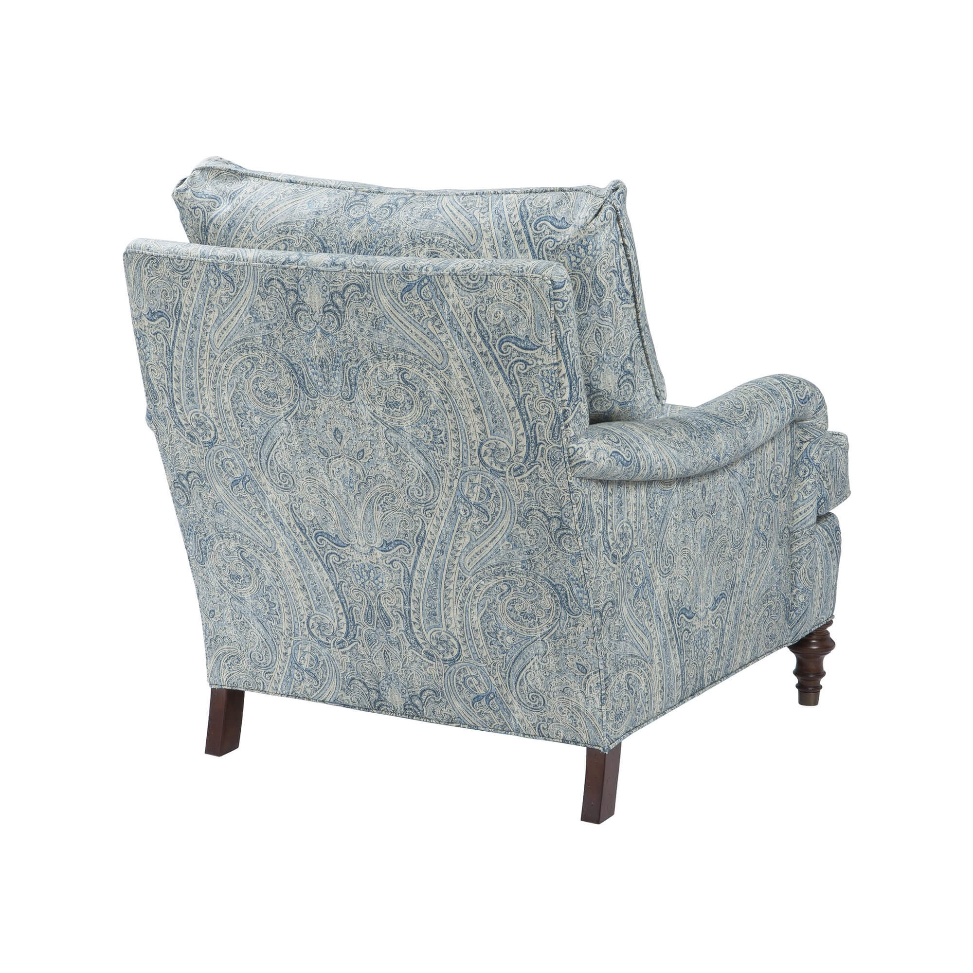 Blue paisley upholstered armchair, back angled view.