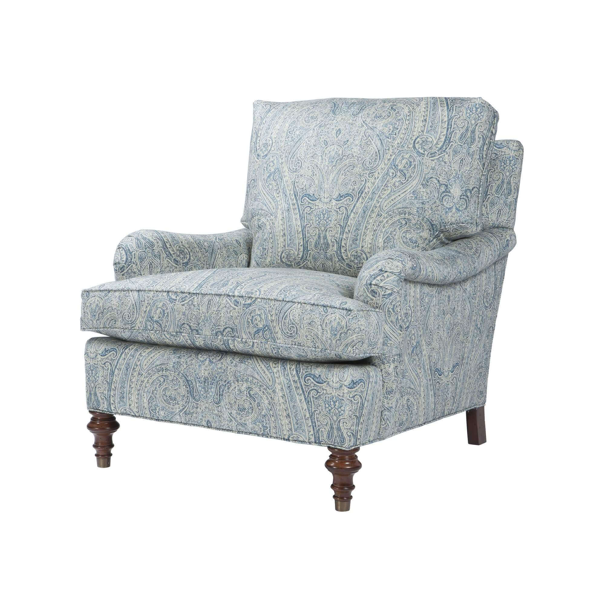 Blue paisley upholstered armchair, front angled view.