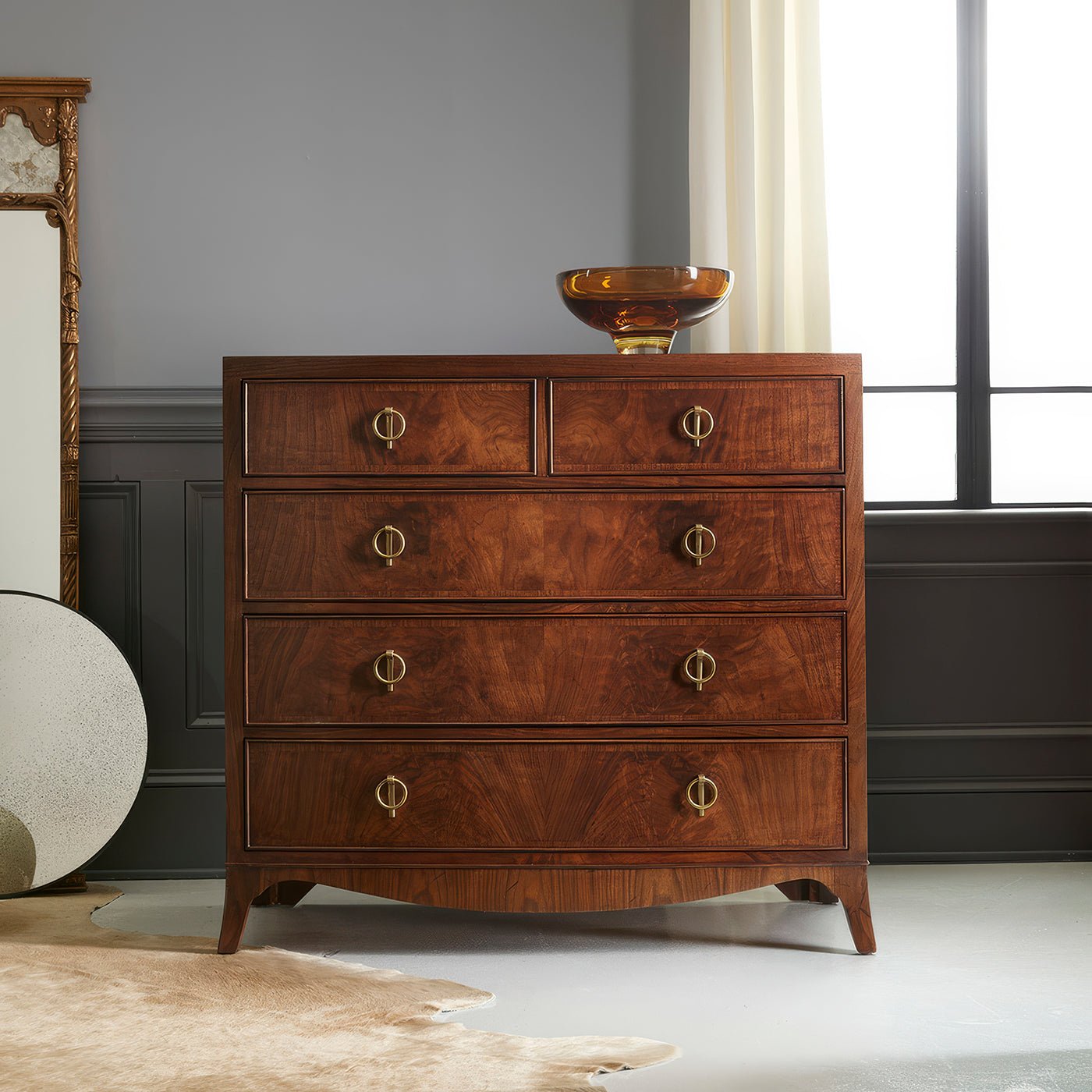 English walnut chest of drawers, styled in modern room.