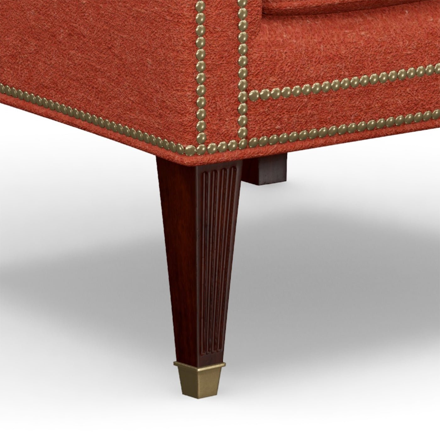 Leg and base detail of red English wingchair.