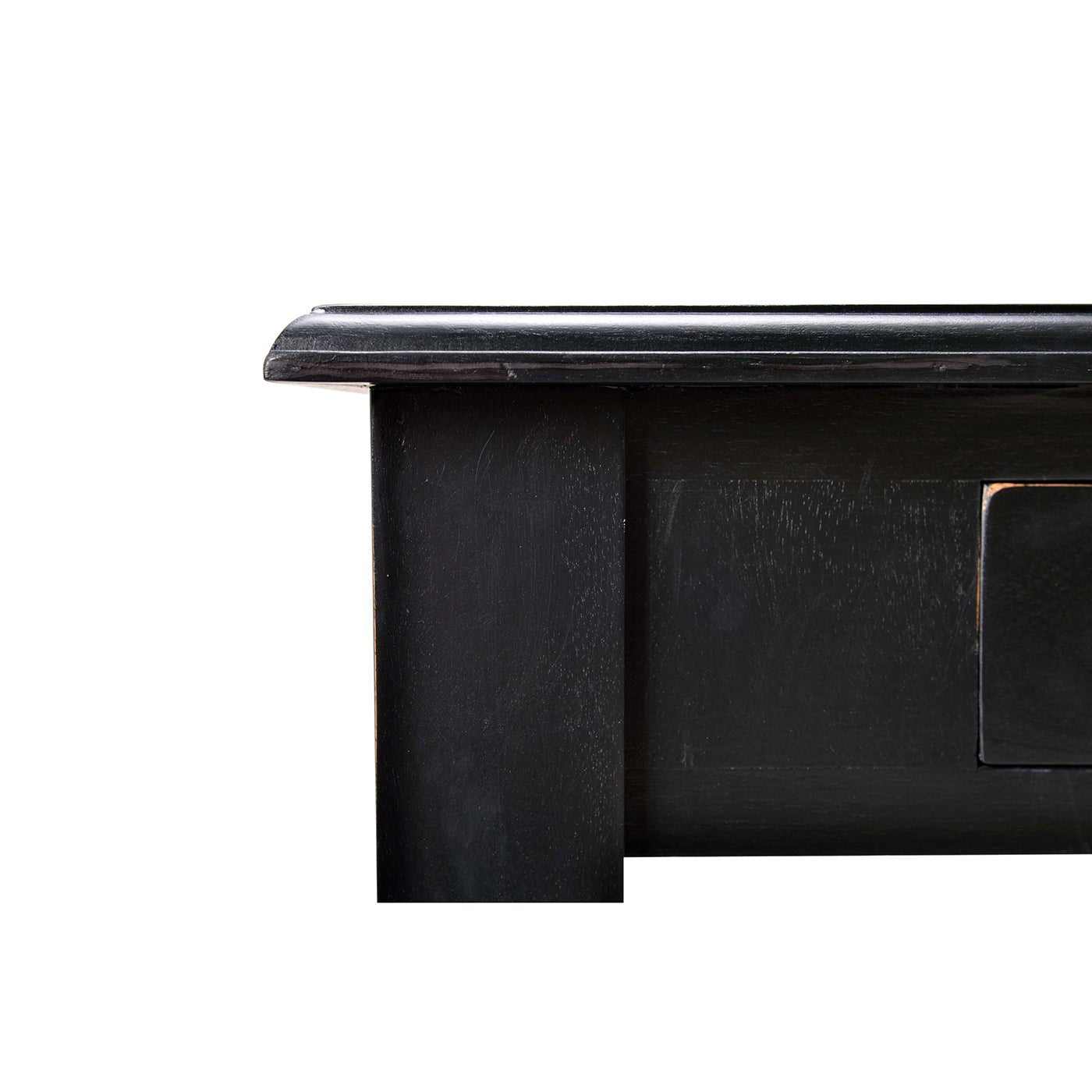 Black rustic desk close-up, corner and edge.