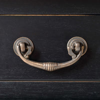 Black rustic desk drawer handle, metal detail.