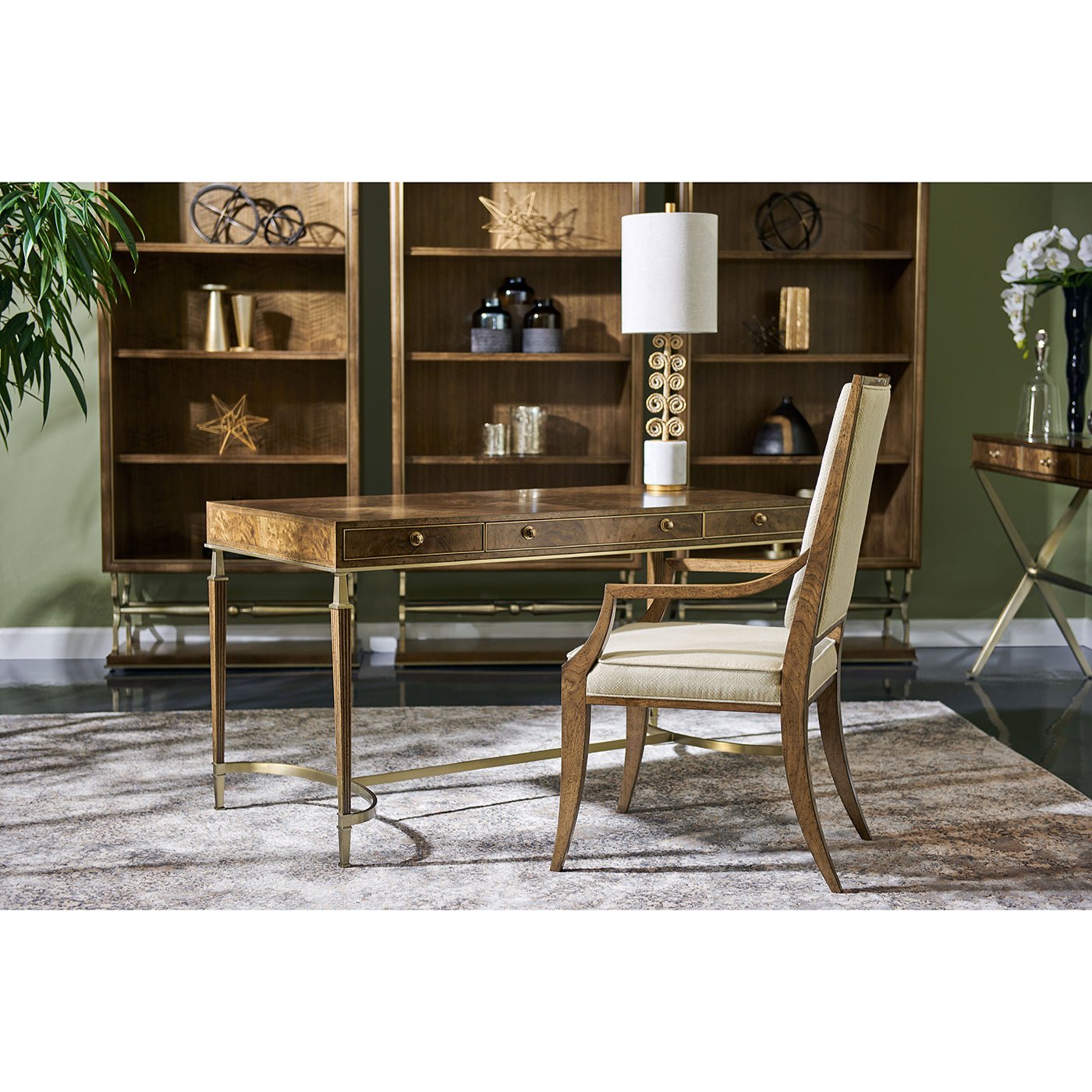 Walnut desk in home office setup, chair included.