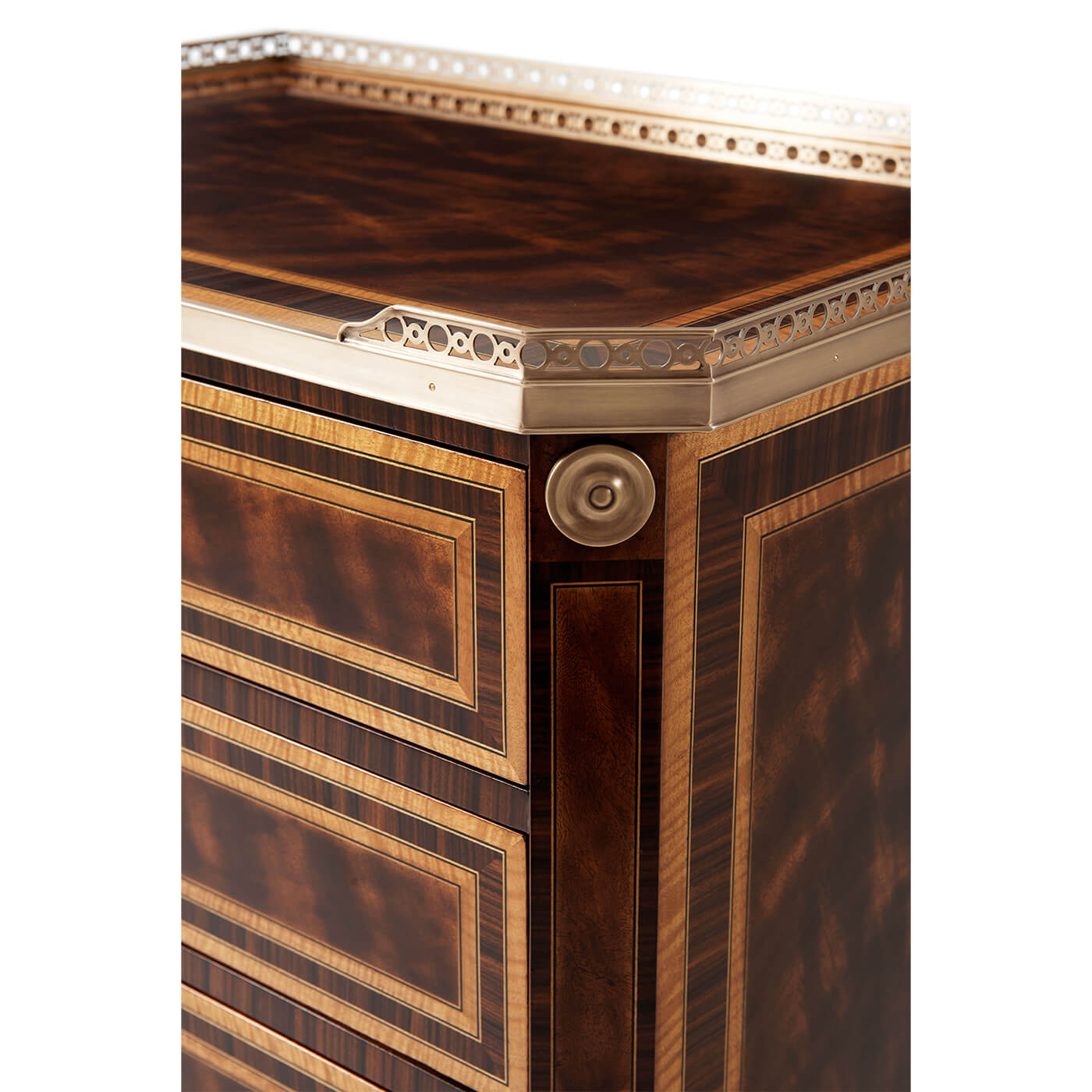 Side corner of neoclassic nightstand with brass accents.