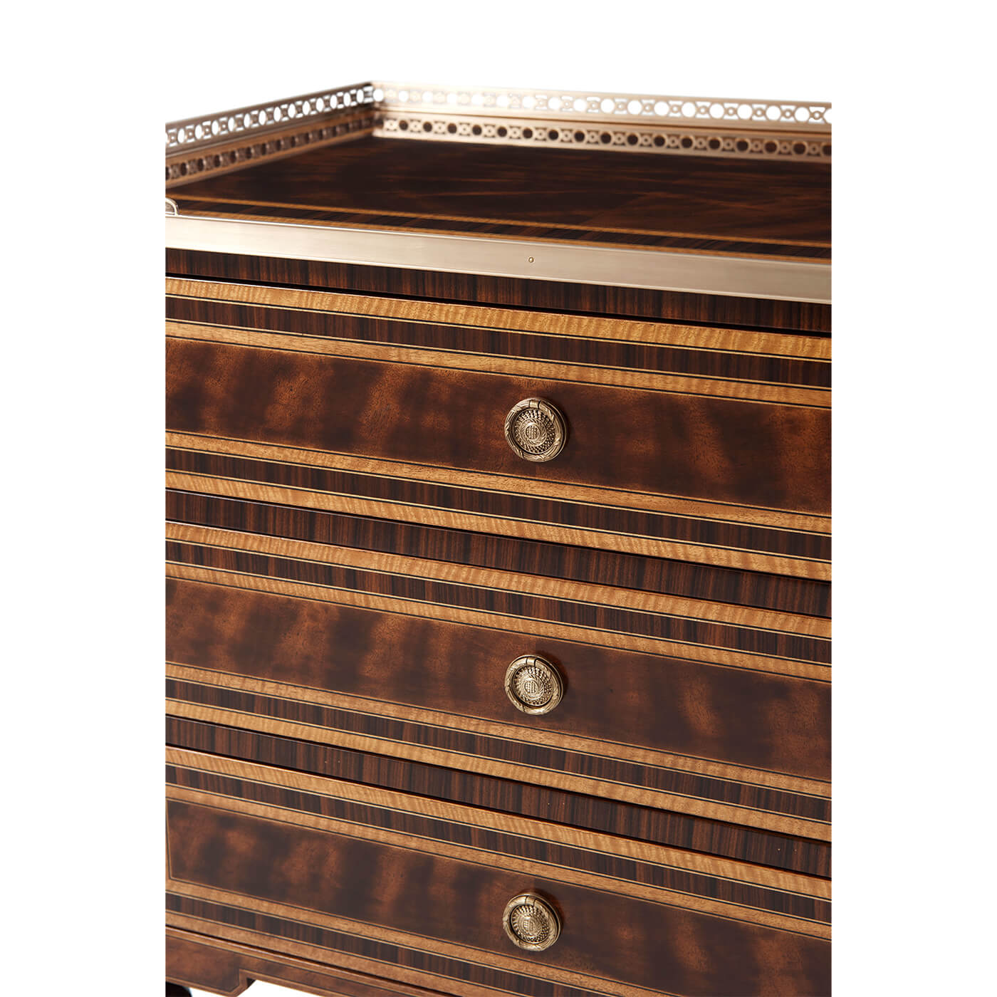 Detailed view of nightstand drawers with brass handles.