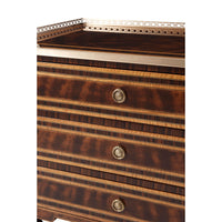 Detailed view of nightstand drawers with brass handles.