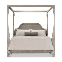 European style canopy bed, front view with bedding.