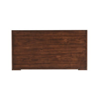 Top view of walnut dresser surface.