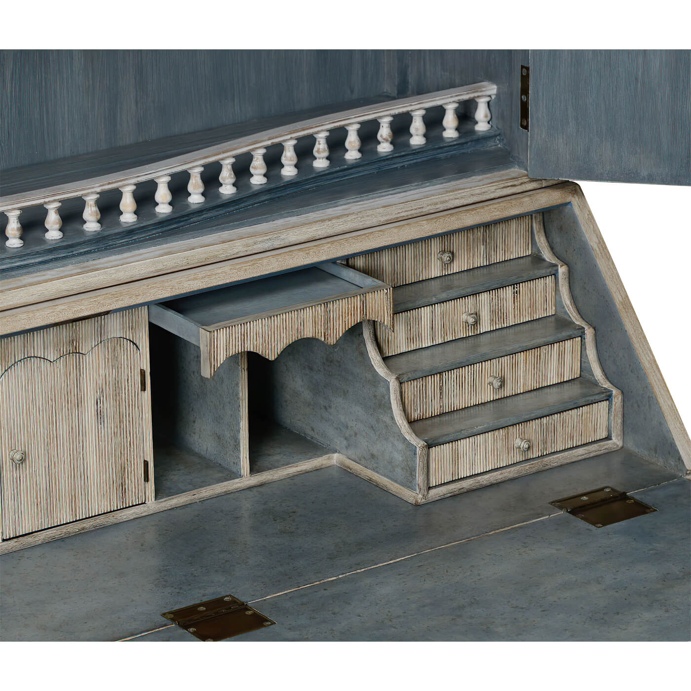 Detailed view of drawers in secretary bookcase desk.