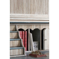 Interior compartments and books in secretary bookcase.