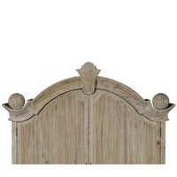 Arched top design detail of secretary bookcase.