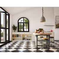 Farmhouse kitchen with butcher block island centerpiece.
