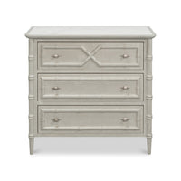 Faux bamboo chest, front view with drawers closed.