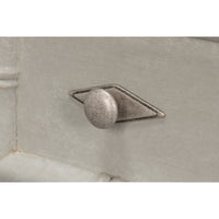 Close-up of faux bamboo chest drawer knob.