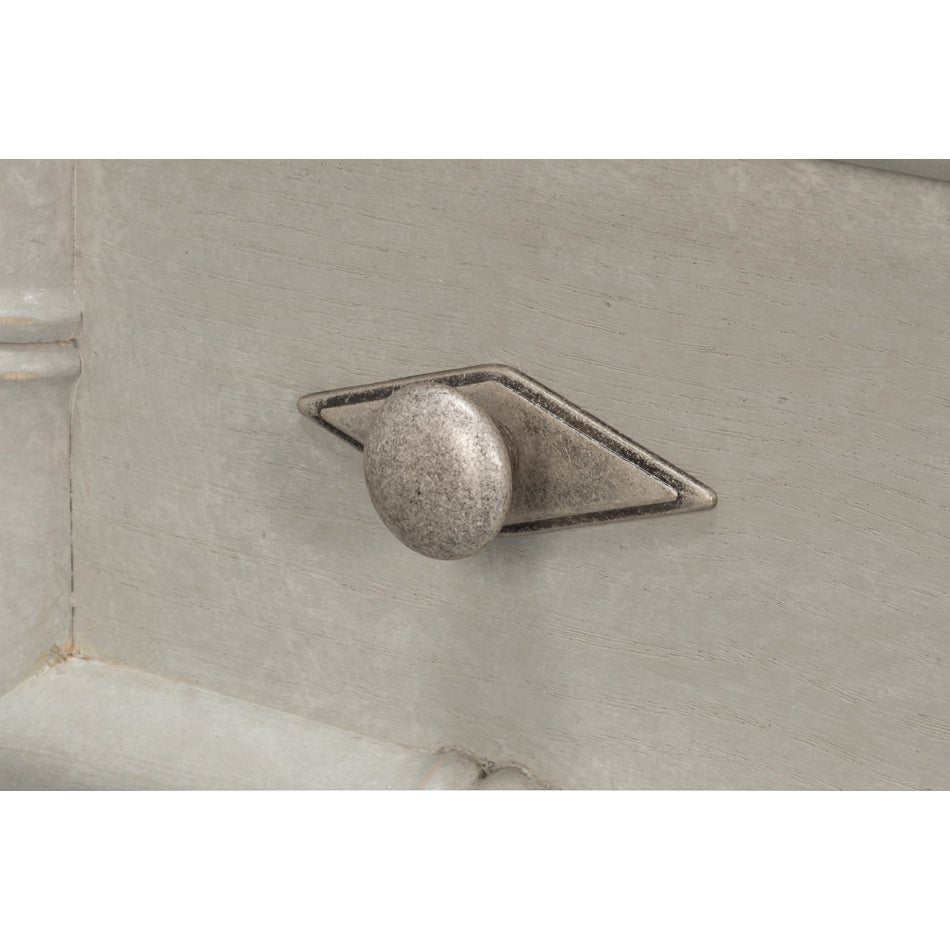 Close-up of faux bamboo chest drawer knob.