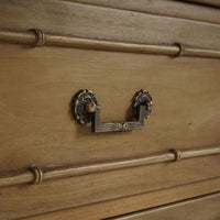 Faux bamboo chest drawer handle close-up