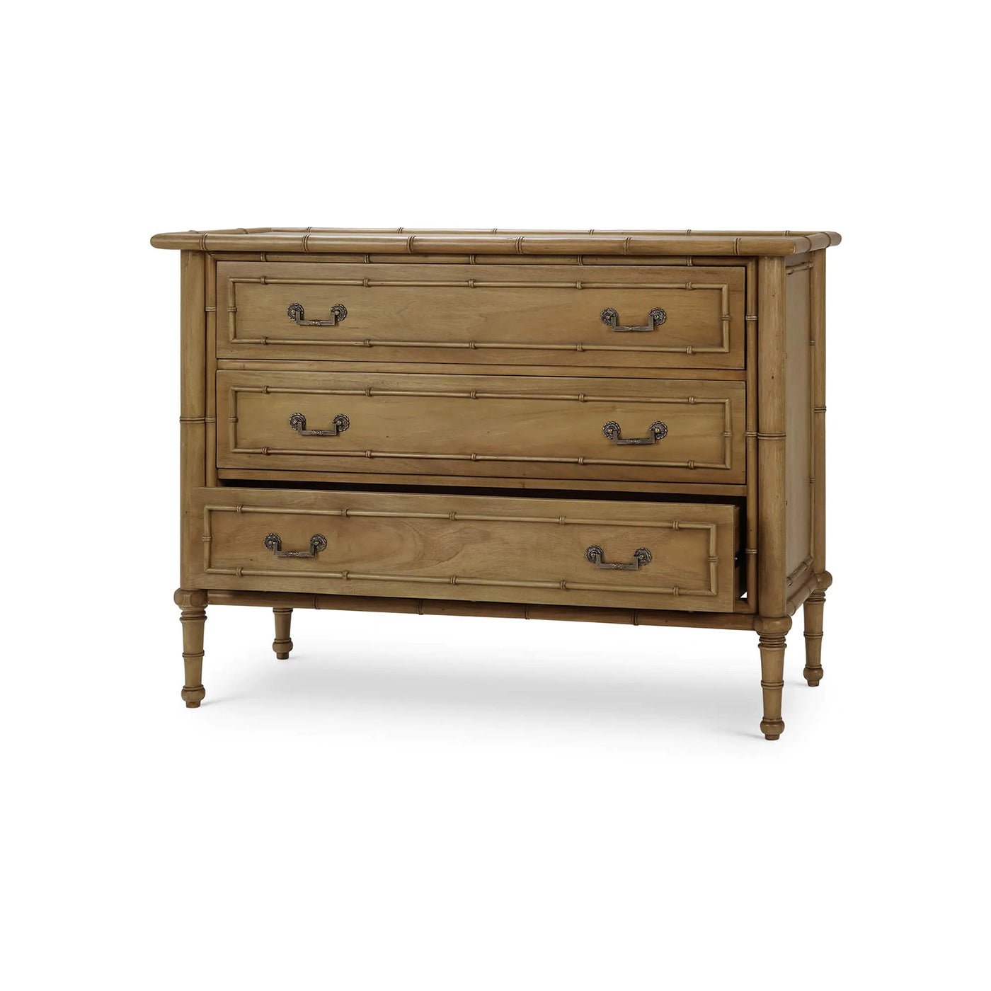 Drawer slightly open on faux bamboo chest