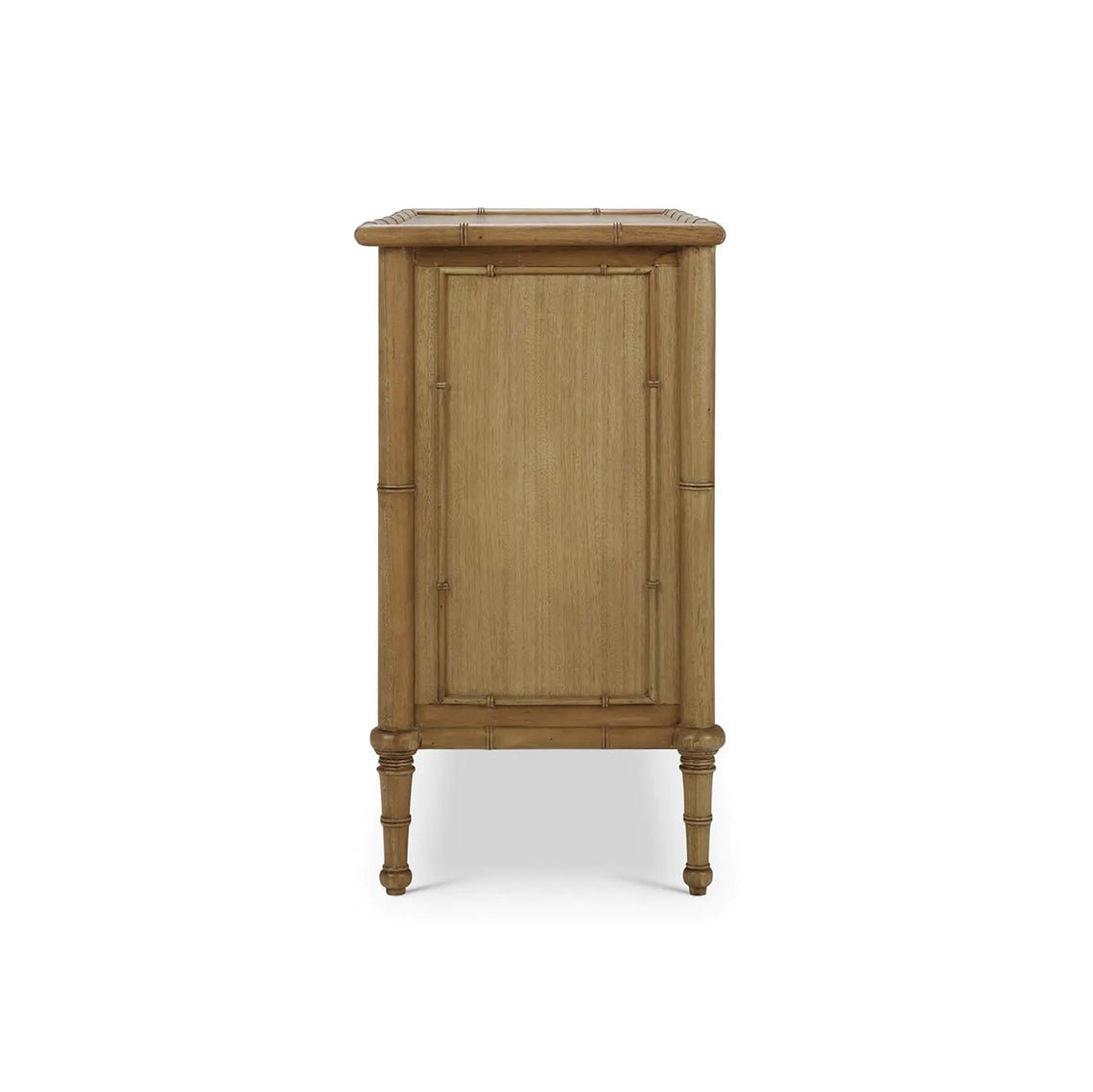 Side view of faux bamboo three drawer chest