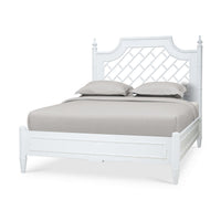 White queen bed with lattice headboard, front angle view.