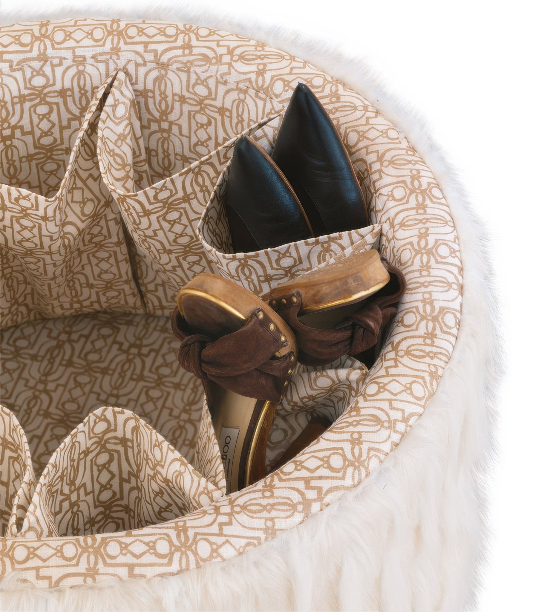 Inside view of ottoman with shoe storage compartments.