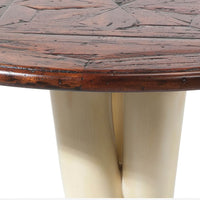 Side view highlighting table's leg transition detail.