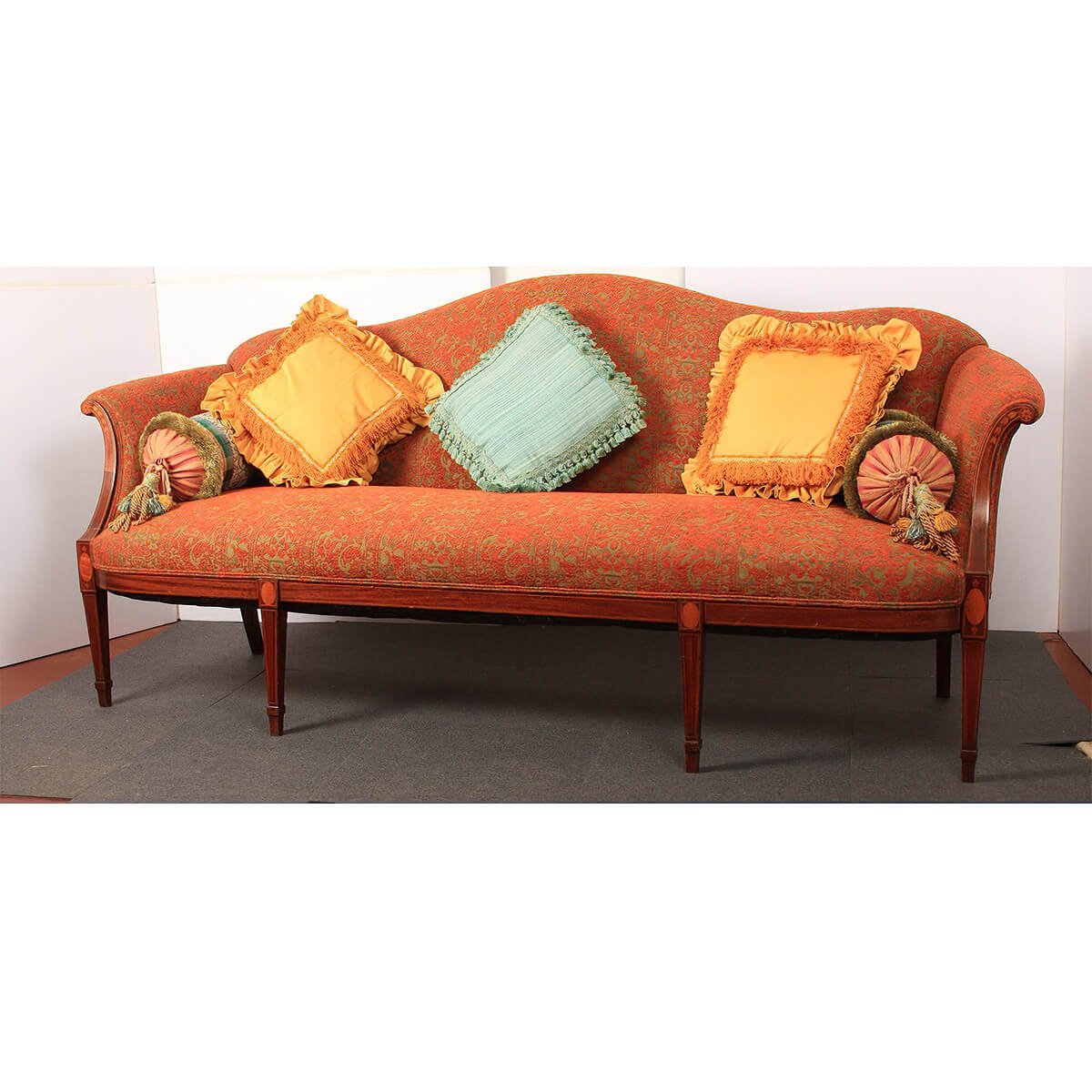 Bright Federal sofa featuring vibrant pillows, full view.