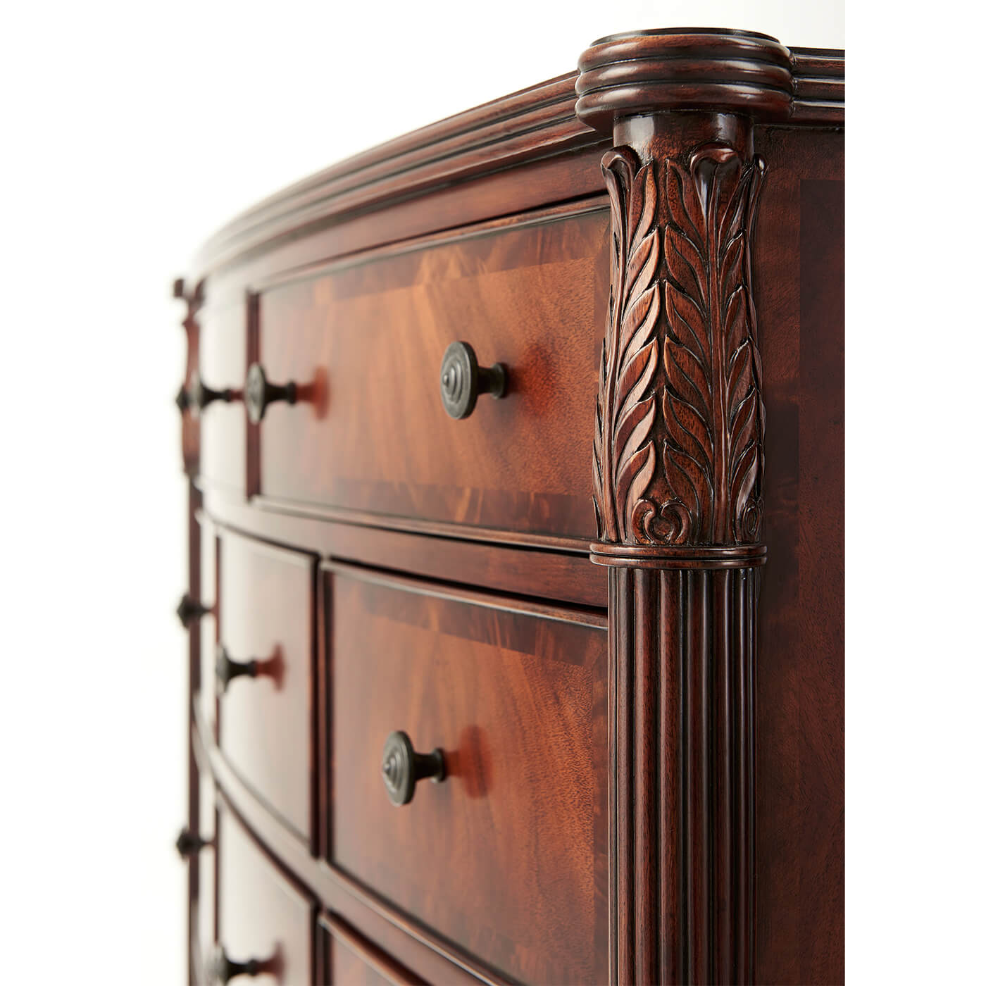 Close-up of carved details on federal mahogany chest.