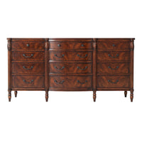 Front view of mahogany dresser with drawers and handles.