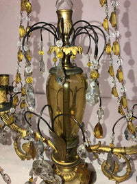 Close-up of Russian candelabra centerpiece and hanging crystals.