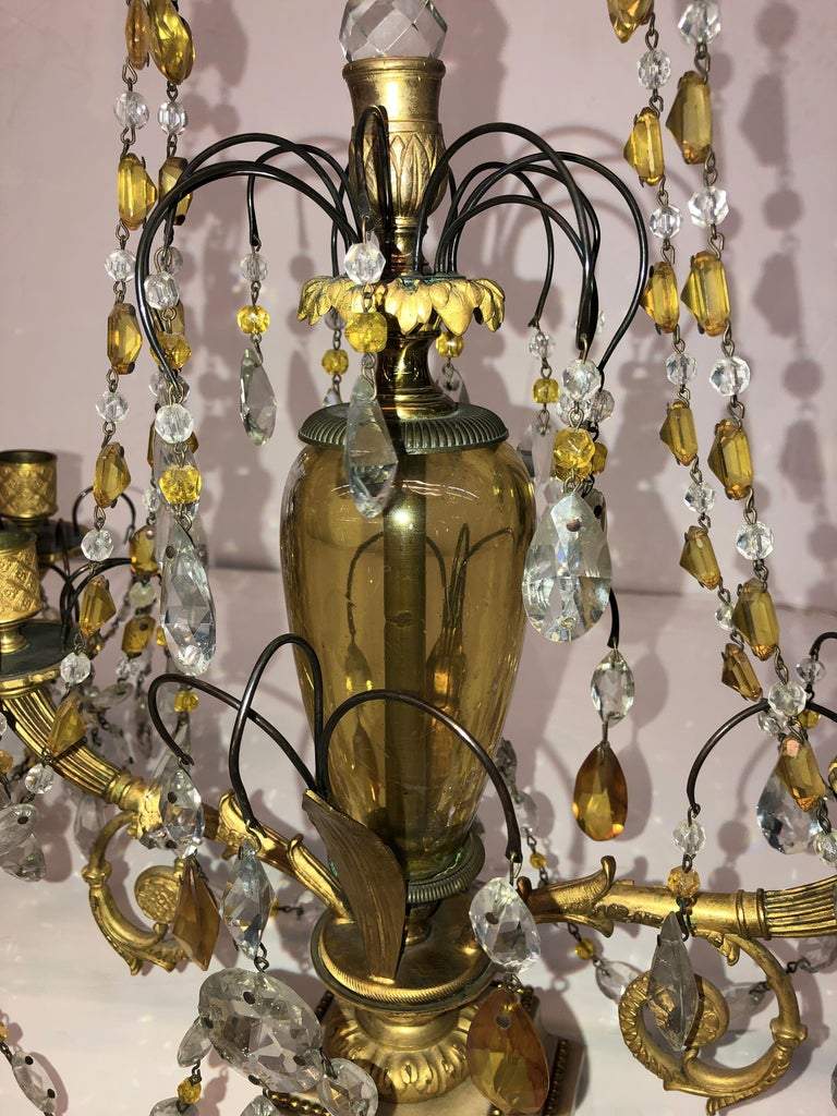 Close-up of Russian candelabra centerpiece and hanging crystals.