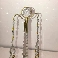 Top detail of Russian candelabra with crystal ornament.