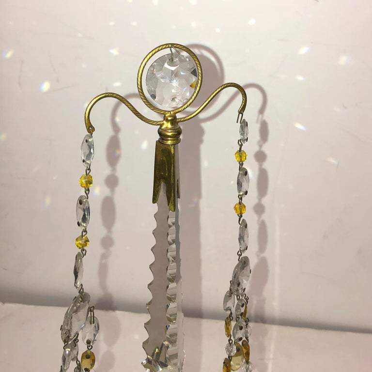 Top detail of Russian candelabra with crystal ornament.