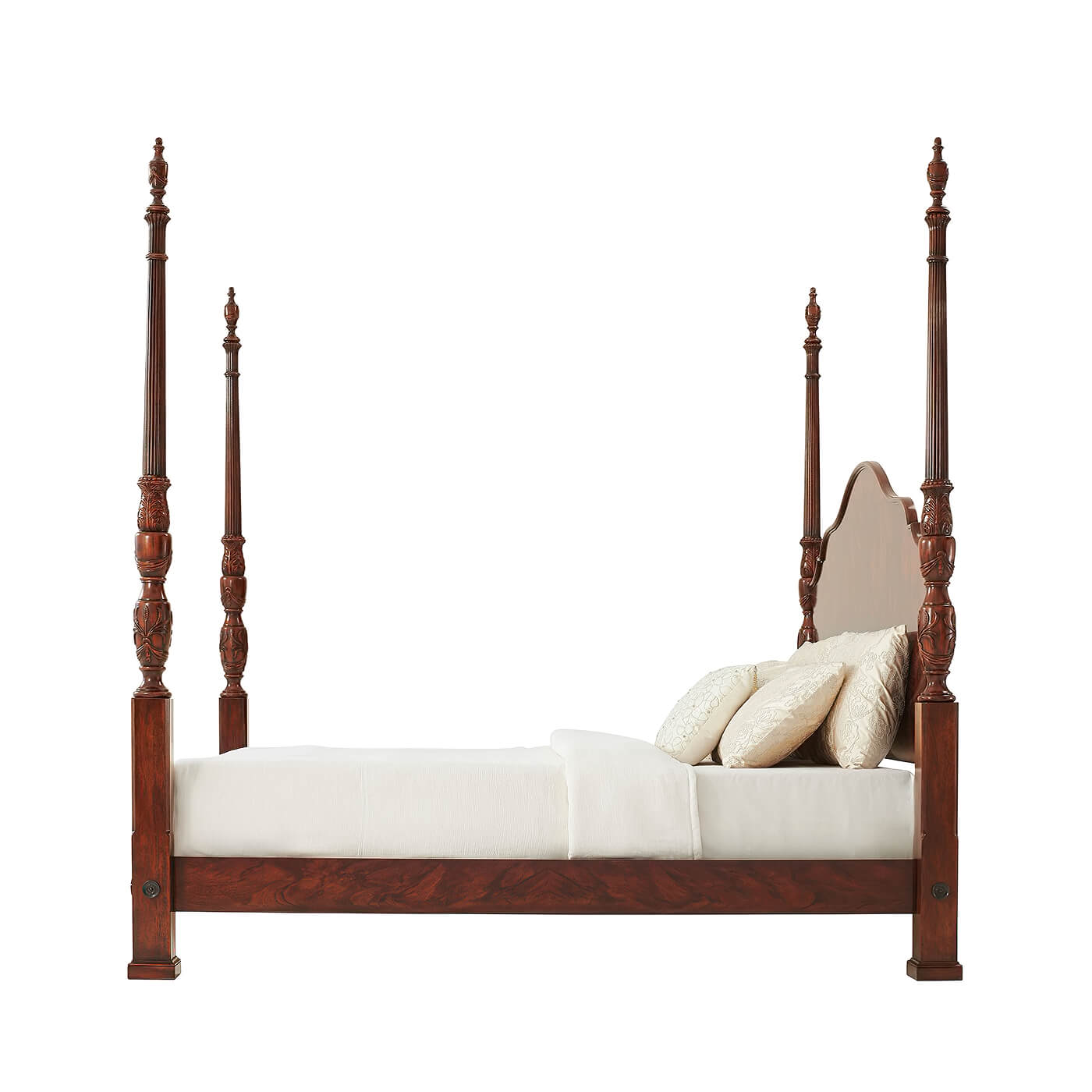 Side view of mahogany four post king size bed.