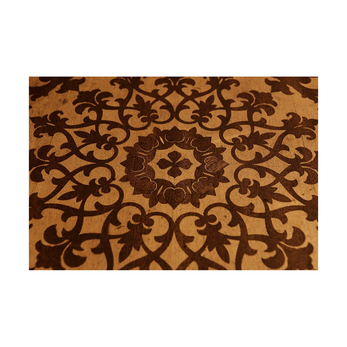 Detailed inlay pattern on mahogany center table.