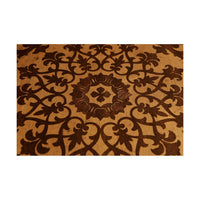Detailed inlay pattern on mahogany center table.