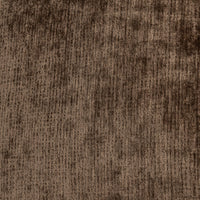 Close-up of brown sectional upholstery showing the varied woven texture