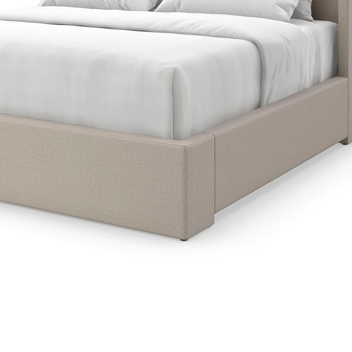 Close-up of flared upholstered king bed's footboard.