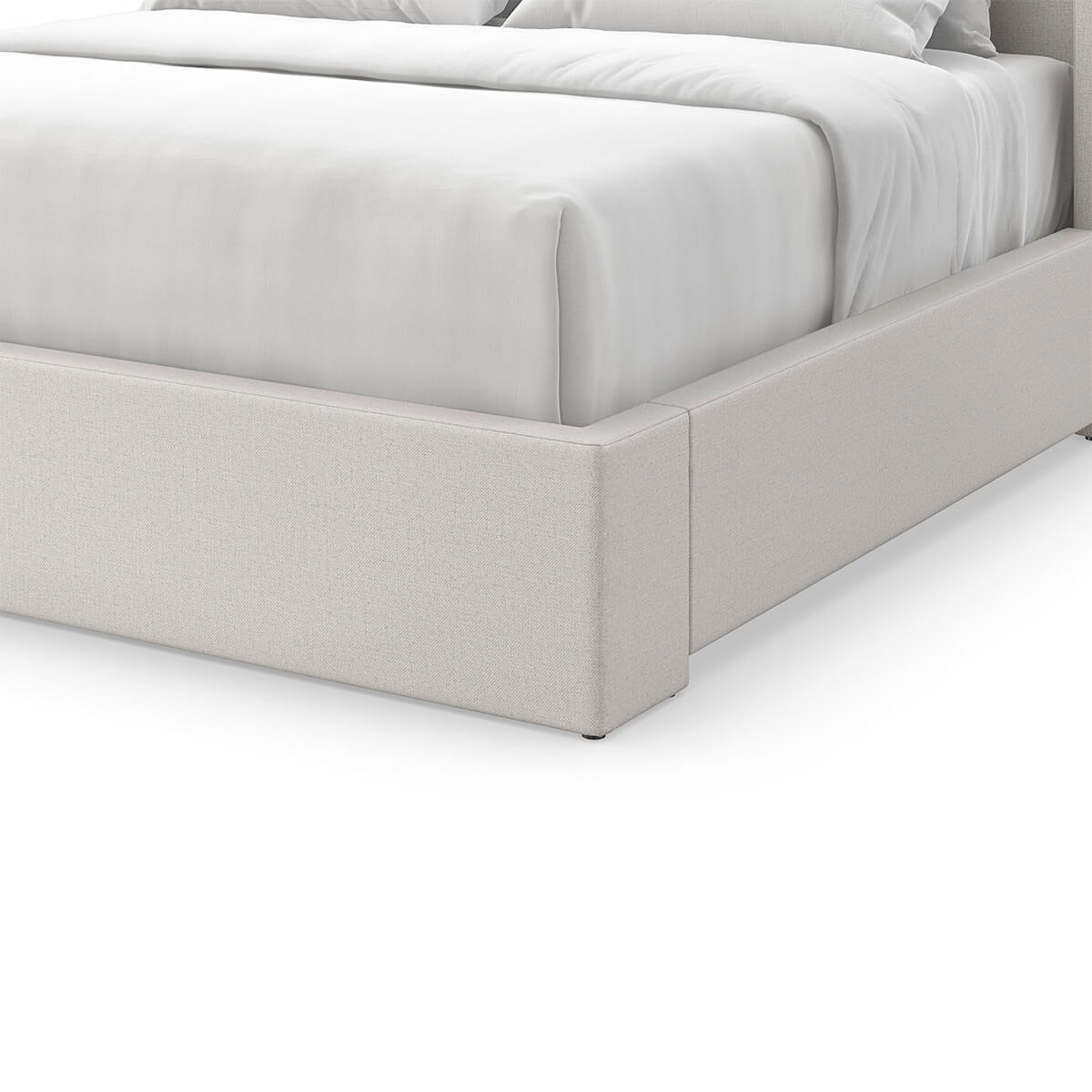 Close-up of light upholstered queen bed frame detail.