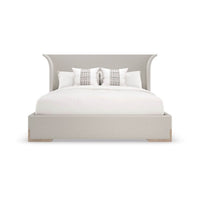 Front view of flared modern upholstered king bed.