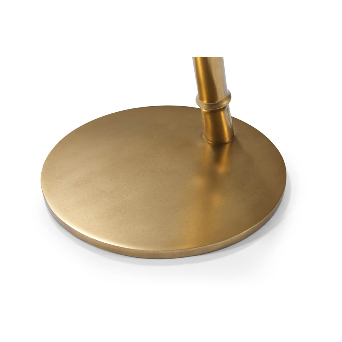 Close-up of golden base detail, accent table.