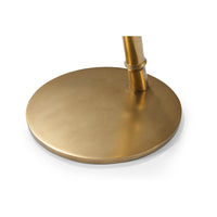 Close-up of golden base detail, accent table.