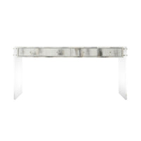 Front view of acrylic desk with metallic accents.