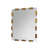 Modern mirror with brass accents, isolated view.