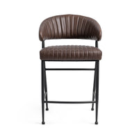 Front view of the fluted brown leather counter stool with channel stitching across the back and seat