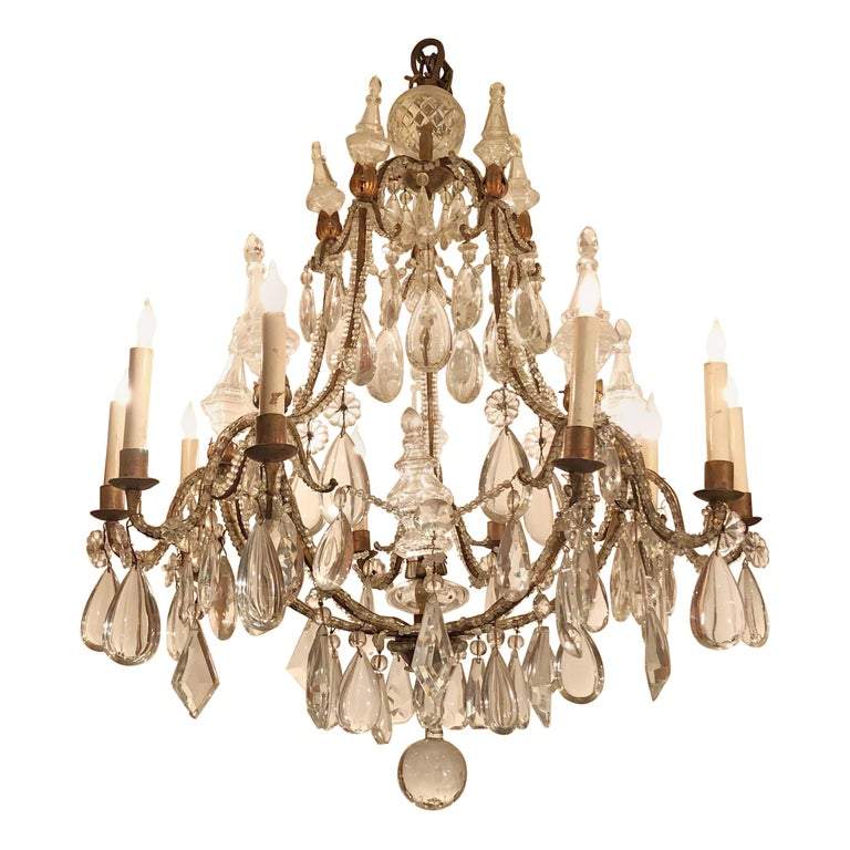 Elegant French 10-light chandelier with crystal design.