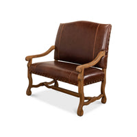 Dark brown leather settee with wooden arms, angled view.