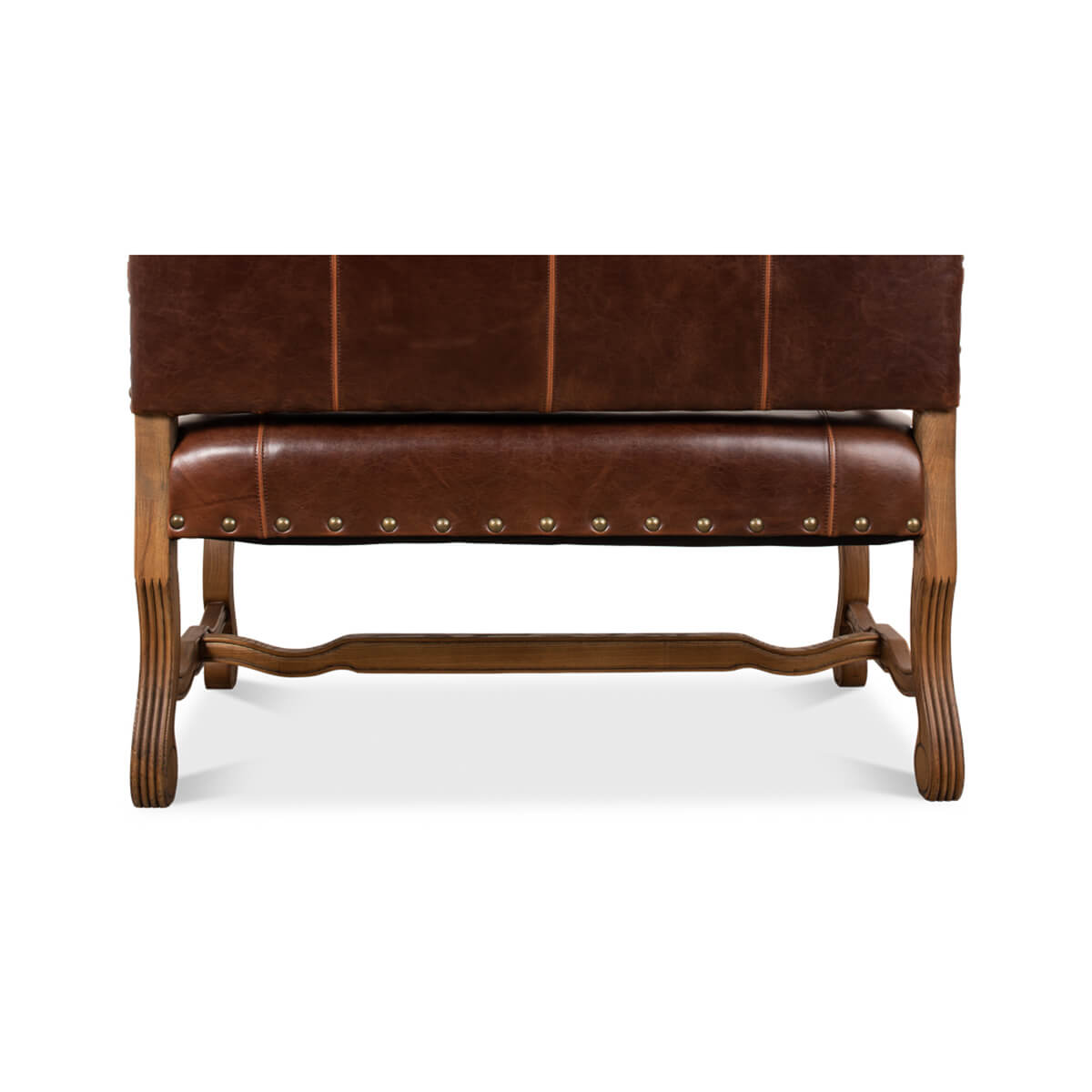 Bottom detail of leather settee, wooden leg support.