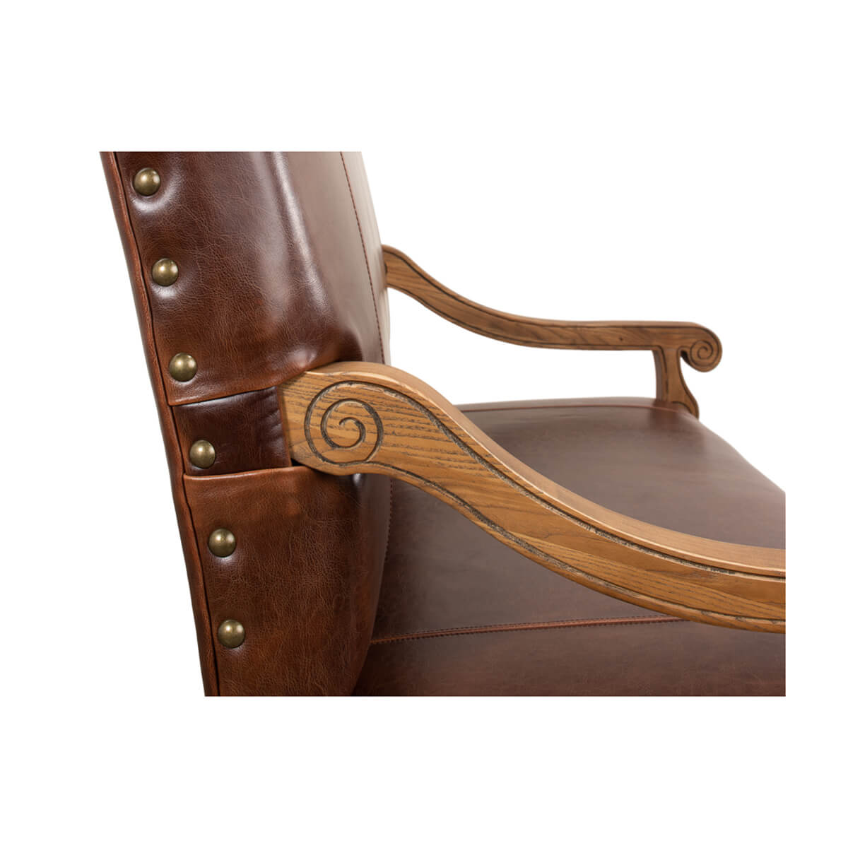 Close-up of settee’s arm, showing swirl wood design.